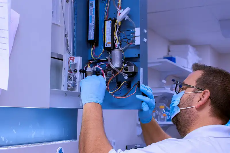 BalCon Tab Technician testing critical air controls for a lab