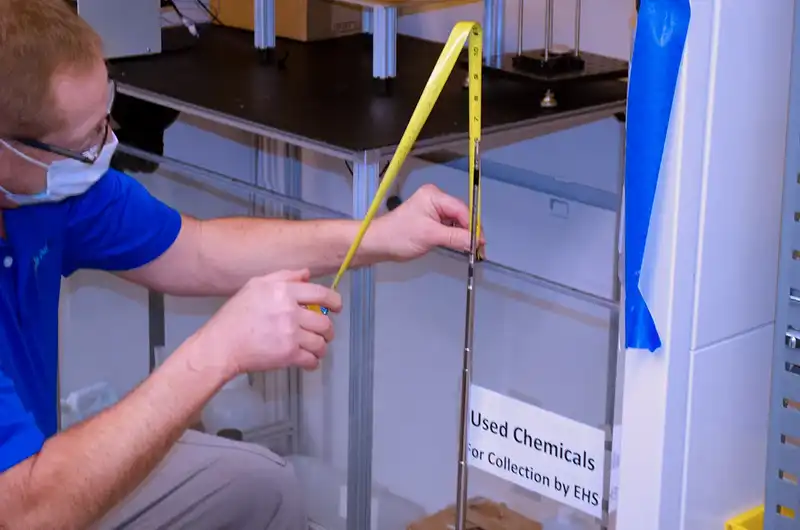 BalCon Tab Technician measuring a cross draft in a laboratory