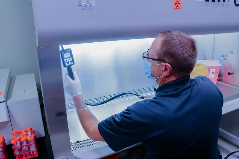 BalCon Lab Technician monitoring tracer gases in a fume hood